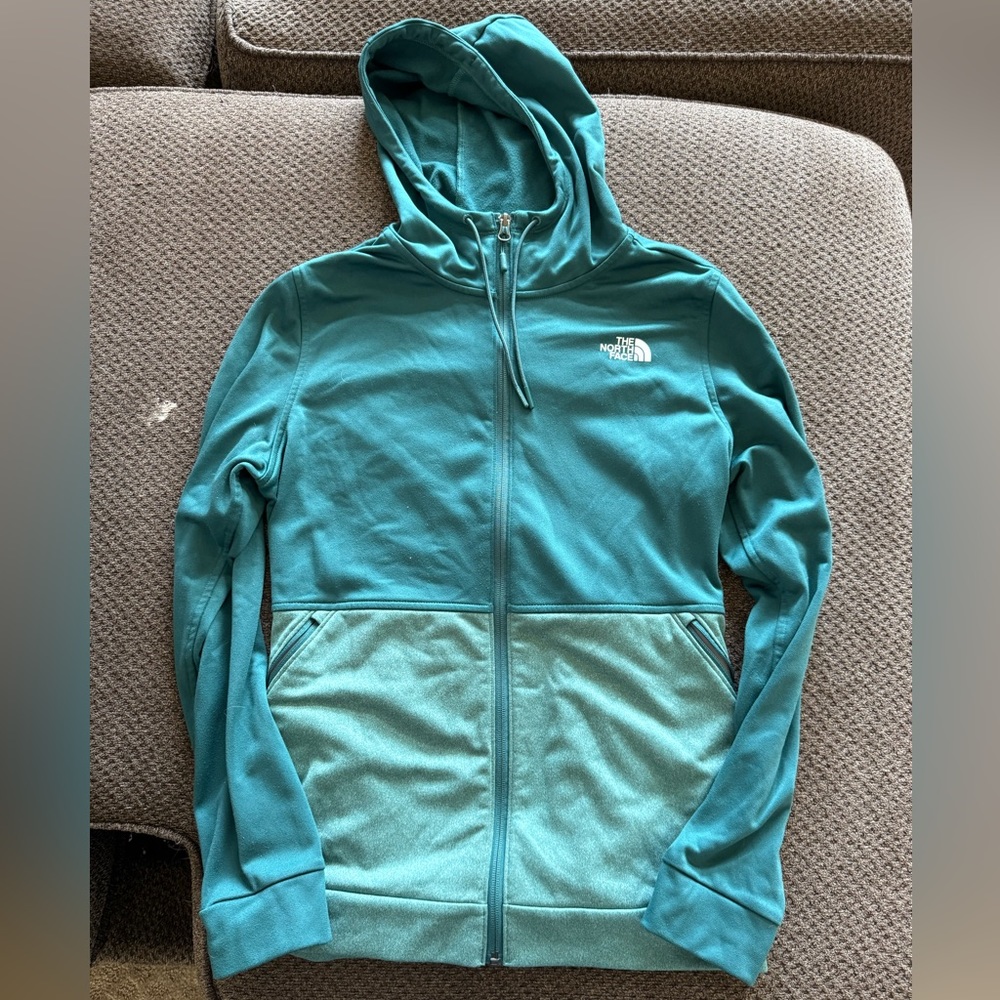 Women’s large Northface zip up hoodie.